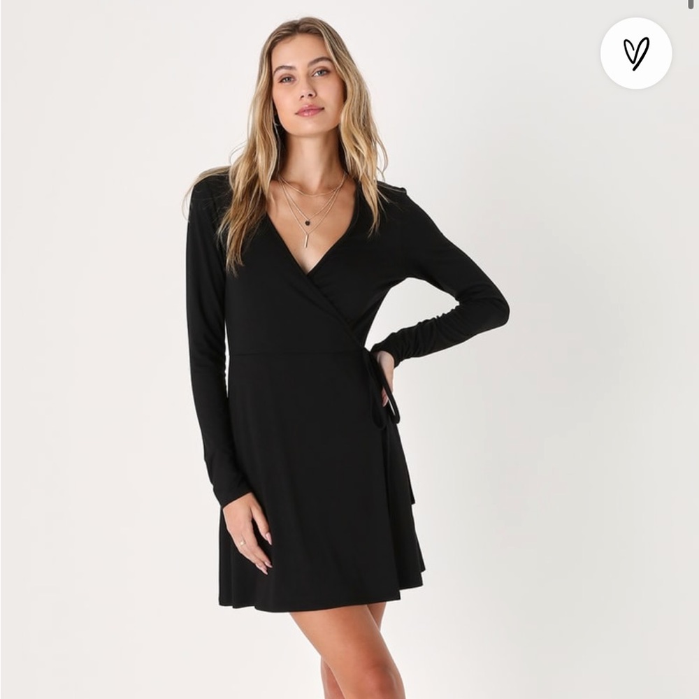 Effortlessly pretty black long sleeve mini dress!